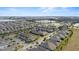 Wide view of the neighborhood, featuring a lake and various homes at 16926 Reseda Aly, Winter Garden, FL 34787