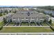 Aerial view of a row of townhouses with landscaping at 16926 Reseda Aly, Winter Garden, FL 34787