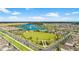 Aerial view of community green space and lake at 16926 Reseda Aly, Winter Garden, FL 34787