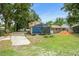 The side of a house under construction, partially covered with a tarp at 1705 Geigel Ave, Orlando, FL 32806