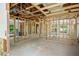 Interior framing of a house under construction, showing multiple rooms at 1705 Geigel Ave, Orlando, FL 32806