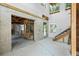 Interior of a house under construction with open staircase at 1705 Geigel Ave, Orlando, FL 32806