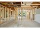 Interior framing of a house under construction, showing various rooms at 1705 Geigel Ave, Orlando, FL 32806