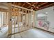 Interior of a house under construction, showing framing and windows at 1705 Geigel Ave, Orlando, FL 32806