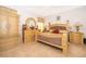 Spacious bedroom with wood furniture and tile floors at 181 Tall Pines Pass, Kissimmee, FL 34759