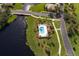 Community pool with surrounding patio and lounge chairs at 181 Tall Pines Pass, Kissimmee, FL 34759