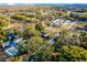 Aerial view of a house with a pool at 208 S Main Ave, Minneola, FL 34715