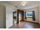 Cozy bedroom with built-in shelves and wood flooring at 208 S Main Ave, Minneola, FL 34715