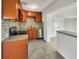 Modern kitchen with granite countertops and stainless steel appliances at 211 Palm Pl, Sanford, FL 32773