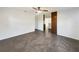 Bright living room with tile floors and view into kitchen at 211 Palm Pl, Sanford, FL 32773