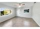 Spacious living room featuring neutral color palette and tile flooring at 211 Palm Pl, Sanford, FL 32773