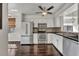 Modern kitchen with stainless steel appliances and dark hardwood floors at 2419 Gallery View Dr # 10, Winter Park, FL 32792