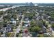 Aerial view showing home's location in a residential neighborhood, close to a main road and the city skyline at 2420 Musselwhite Ave, Orlando, FL 32804