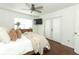 Bright bedroom with wood flooring and access to patio at 2420 Musselwhite Ave, Orlando, FL 32804