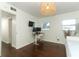 Bright bedroom with hardwood floors and built-in workspace at 2420 Musselwhite Ave, Orlando, FL 32804