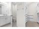 Clean bathroom with white cabinets and a toilet at 2438 Pearl Cider Street, Orlando, FL 32824