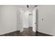 Spacious bedroom with double doors and hardwood floors at 2438 Pearl Cider Street, Orlando, FL 32824