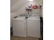 Laundry room with washer, dryer, and storage shelves at 246 Orienta Point St # 246, Altamonte Springs, FL 32701