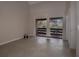 Living room with sliding doors leading to a balcony at 246 Orienta Point St # 246, Altamonte Springs, FL 32701