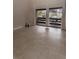 Living room with sliding doors leading to a balcony at 246 Orienta Point St # 246, Altamonte Springs, FL 32701