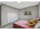 Bedroom with double bed and large closet at 2564 Sheffield Ave, Orlando, FL 32806