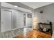 Bright entryway with wood-look floors and tiled accents at 2564 Sheffield Ave, Orlando, FL 32806