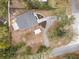 Overhead view showcasing house, yard, and shed at 25753 Vero St, Sorrento, FL 32776