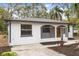 Newly renovated home features a screened porch at 25753 Vero St, Sorrento, FL 32776