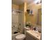 Bathroom with shower/tub combo, vanity, and decor at 28 S Hastings St, Orlando, FL 32835