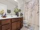 Bathroom with a single vanity and shower/tub combo at 3005 Lake Tahoe St, Deland, FL 32724