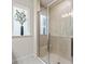 Shower with glass enclosure and built-in seat at 3005 Lake Tahoe St, Deland, FL 32724