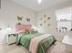 bedroom with pink accents and built-in shelving at 3005 Lake Tahoe St, Deland, FL 32724