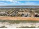 Aerial view of coastal area, showing ocean and buildings at 305 S Halifax Dr, Ormond Beach, FL 32176