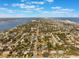 Wide aerial showcasing beachfront community at 305 S Halifax Dr, Ormond Beach, FL 32176