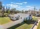 Aerial view of a charming house and yard at 305 S Halifax Dr, Ormond Beach, FL 32176