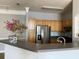 Modern kitchen with stainless steel appliances at 3250 Corona Village Way # 302, Orlando, FL 32835