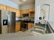 Updated kitchen with stainless steel appliances at 3250 Corona Village Way # 302, Orlando, FL 32835