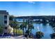 Stunning lake view with lush landscaping and a fountain at 3250 Corona Village Way # 302, Orlando, FL 32835