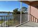 Enjoy lake views from this screened balcony at 3250 Corona Village Way # 302, Orlando, FL 32835