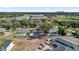 Aerial view of a neighborhood with pools, green spaces, and close proximity to school and stadium at 3334 N Westmoreland Dr, Orlando, FL 32804