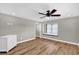 Well lit bedroom with luxury vinyl plank flooring and a nice window seat at 3334 N Westmoreland Dr, Orlando, FL 32804