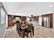 Dining area open to a spacious kitchen with stainless steel appliances at 3334 N Westmoreland Dr, Orlando, FL 32804