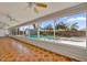 Enclosed patio with a view of the backyard and the pool area, offering a seamless indoor-outdoor experience at 3334 N Westmoreland Dr, Orlando, FL 32804