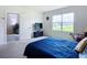 Bedroom with large window and built-in desk at 367 Caryota Ct, New Smyrna Beach, FL 32168