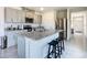 Modern kitchen featuring stainless steel appliances and granite countertops at 367 Caryota Ct, New Smyrna Beach, FL 32168