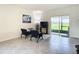 Living area featuring sliding doors to backyard at 367 Caryota Ct, New Smyrna Beach, FL 32168