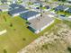 Aerial view of house and surrounding neighborhood at 3842 Whitetail Ct, St Cloud, FL 34772