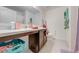 Well-lit bathroom with a vanity, toilet, and shower at 3842 Whitetail Ct, St Cloud, FL 34772