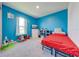 Mickey Mouse-themed bedroom with a twin bed and plenty of storage at 3842 Whitetail Ct, St Cloud, FL 34772