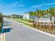 Deer Run Estates entrance with palm trees and landscaping at 3842 Whitetail Ct, St Cloud, FL 34772